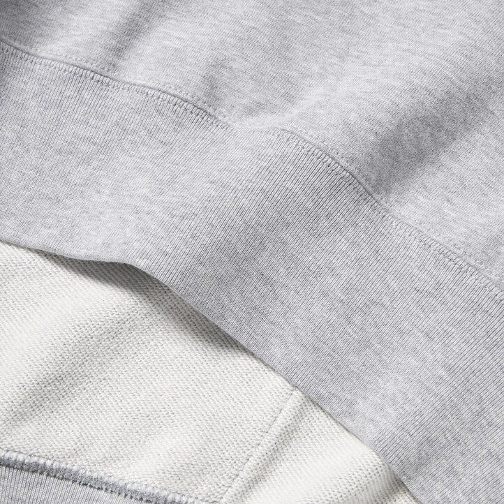 svart uniqlo herrmönstrad sweatshirt med dragkedja