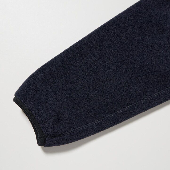 vit uniqlo fleece knäpptröja herrluvtröja