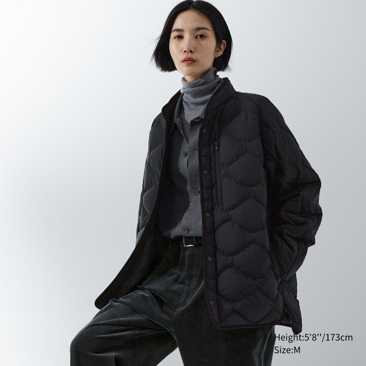 svarta uniqlo herrjackor i återvunnen hybridmodell