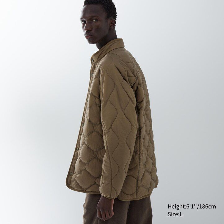 svarta uniqlo herrjackor i återvunnen hybridmodell