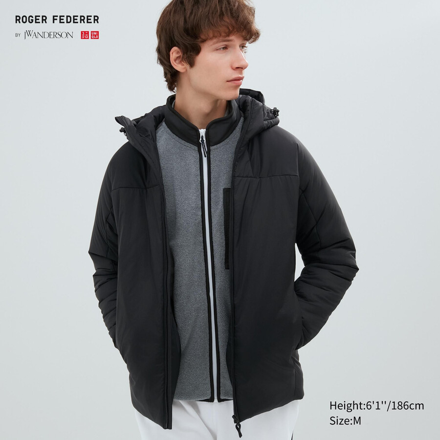 svarta uniqlo light warm vadderade herrjackor