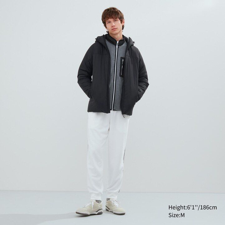 svarta uniqlo light warm vadderade herrjackor