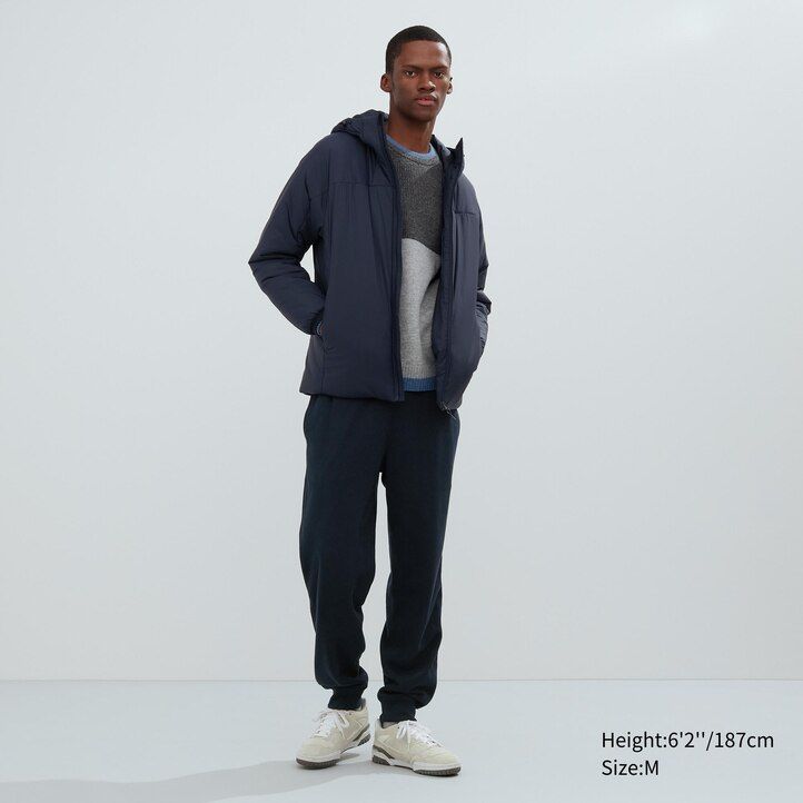 svarta uniqlo light warm vadderade herrjackor