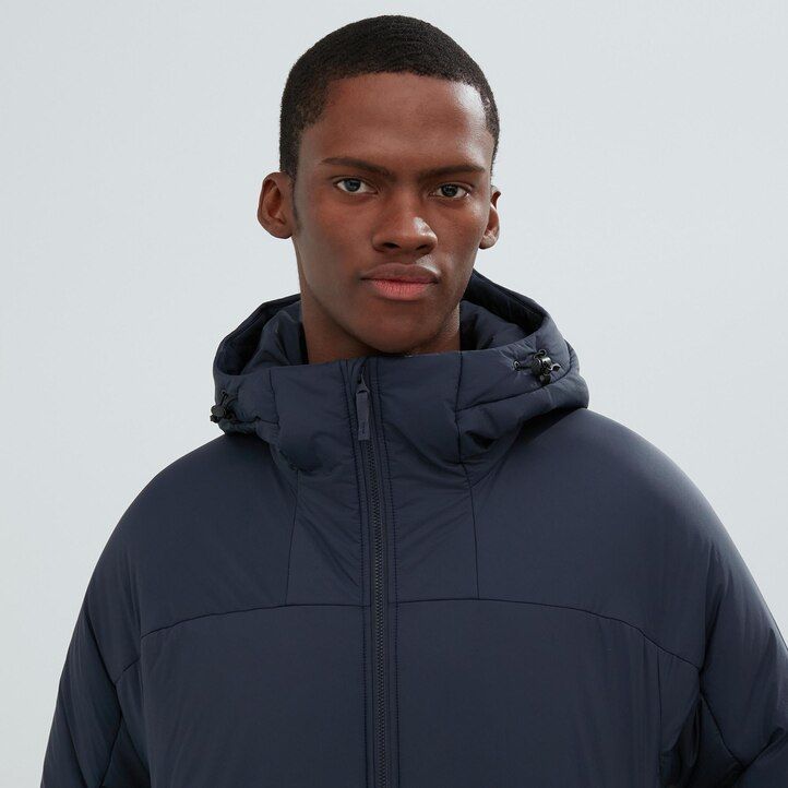 svarta uniqlo light warm vadderade herrjackor