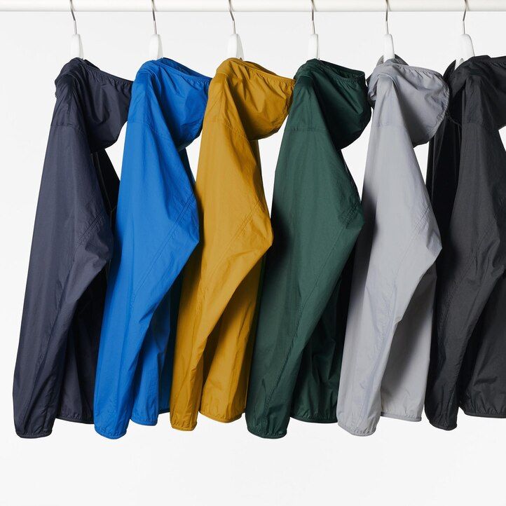orange uniqlo herrjackor med uv-skydd och 3d-snitt fickor