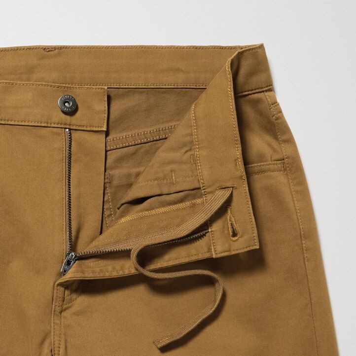 grå uniqlo ultra stretch skinny fit herrjeans i färg