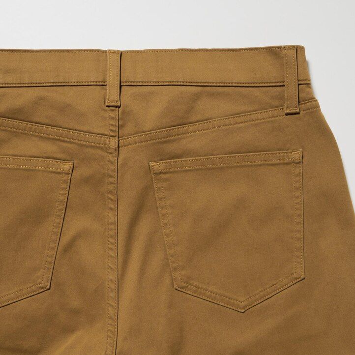grå uniqlo ultra stretch skinny fit herrjeans i färg