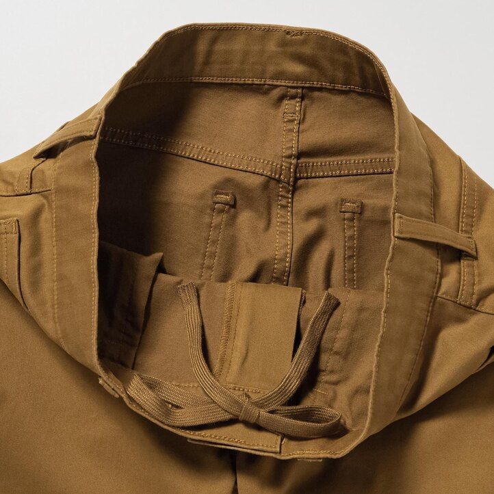 grå uniqlo ultra stretch skinny fit herrjeans i färg
