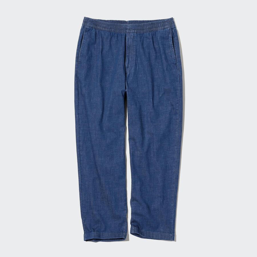 blå uniqlo herrjeans med avslappnad passform och ankellånga