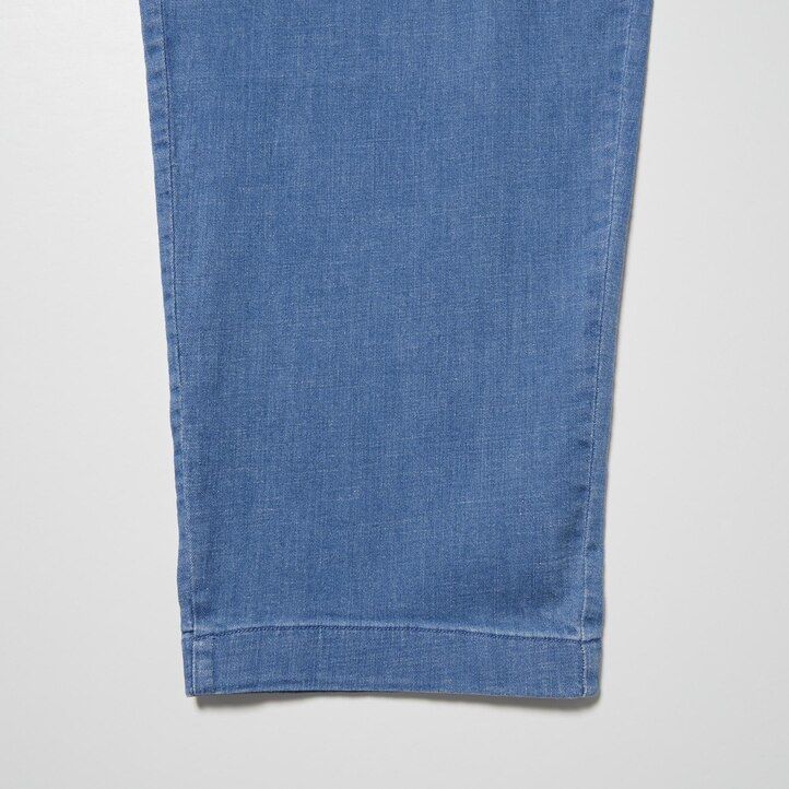 blå uniqlo herrjeans med avslappnad passform och ankellånga