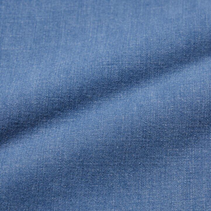 blå uniqlo herrjeans med avslappnad passform och ankellånga