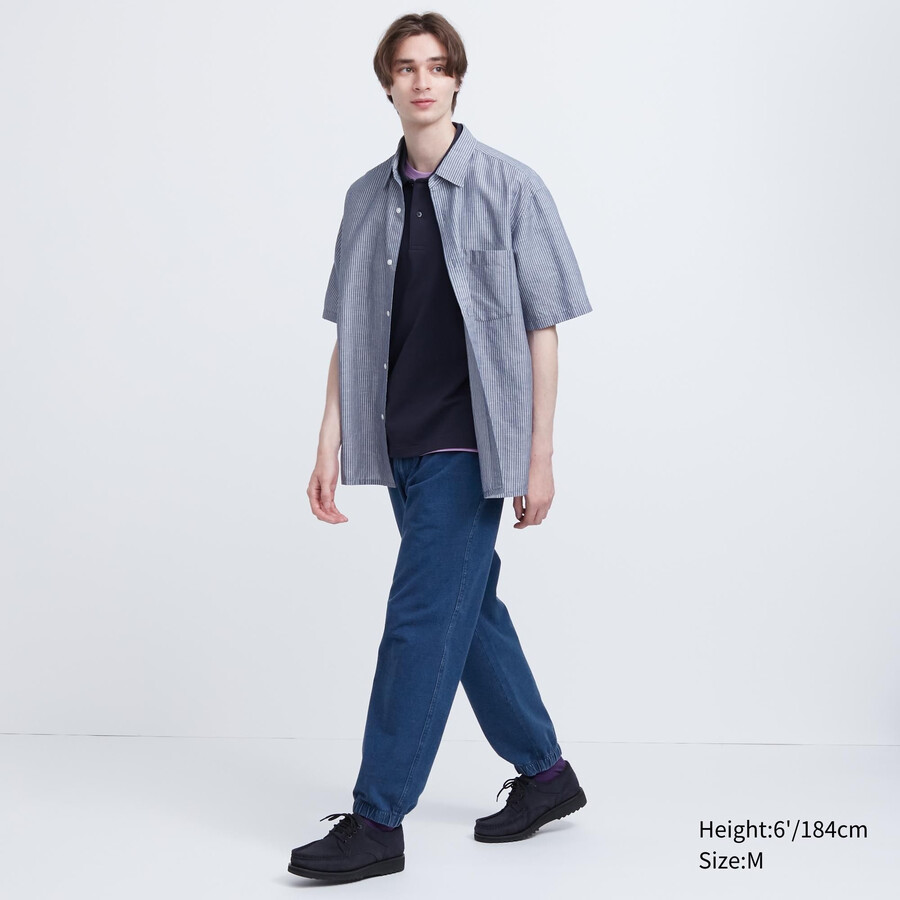 blå herr uniqlo tvättade jersey-joggingbyxor med denimlook