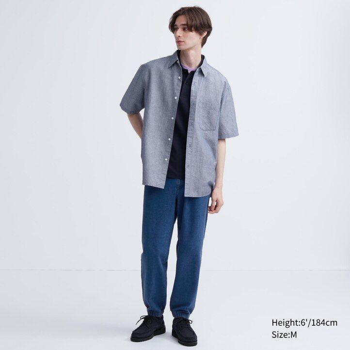 blå herr uniqlo tvättade jersey-joggingbyxor med denimlook