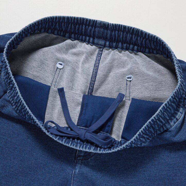 blå herr uniqlo tvättade jersey-joggingbyxor med denimlook