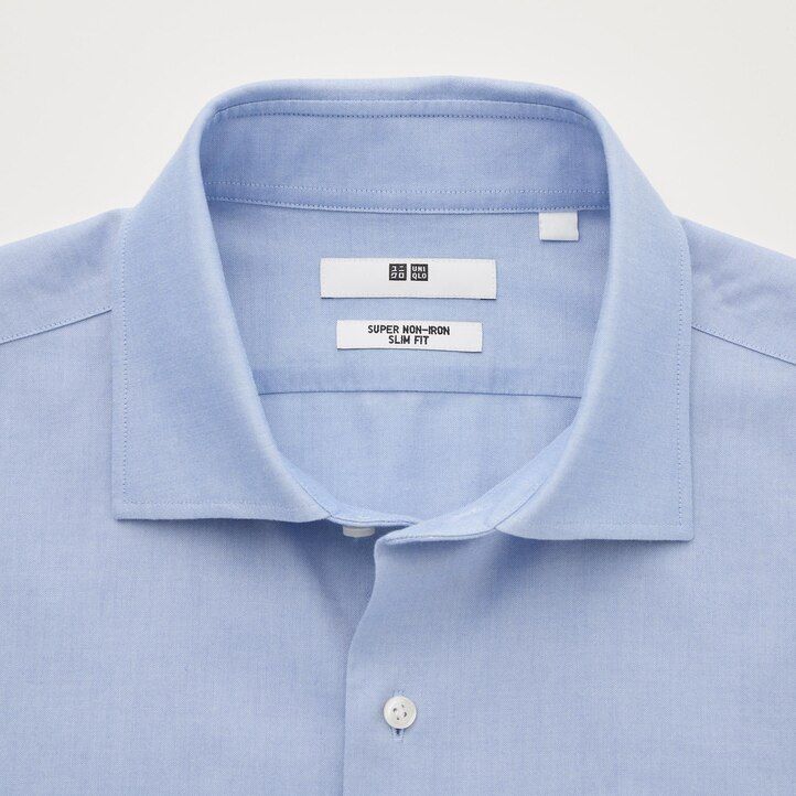 vit uniqlo super non iron slim fit t-shirt med halv cutaway krage för män
