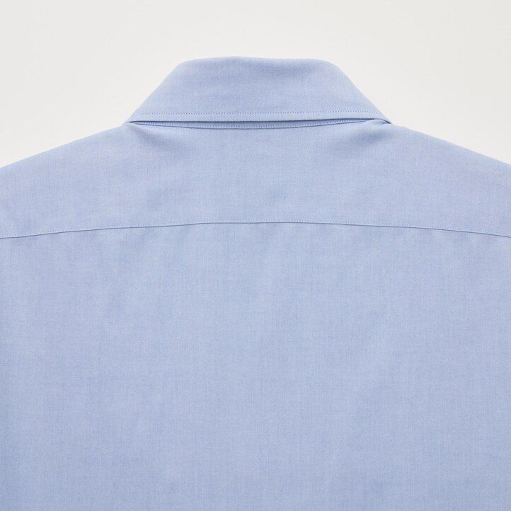 vit uniqlo super non iron slim fit t-shirt med halv cutaway krage för män