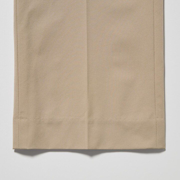 svarta uniqlo airsense ultralätta herrkostymer i bomullsliknande material