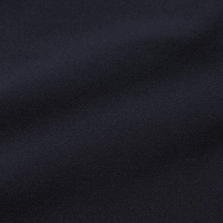 herr uniqlo tvåvägsstretchiga plisserade avsmalnande byxor i beige