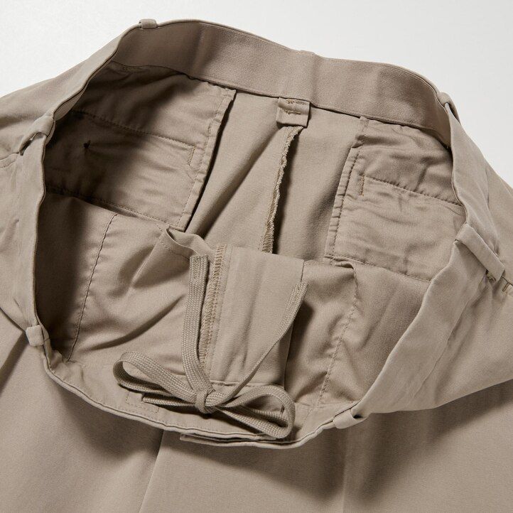 beige uniqlo smart bomullsliknande ankellånga herrbyxor