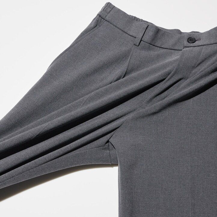 grå uniqlo plisserade byxor med vida ben för män