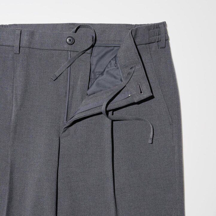 uniqlo plisserade herrbyxor med vida ben beige