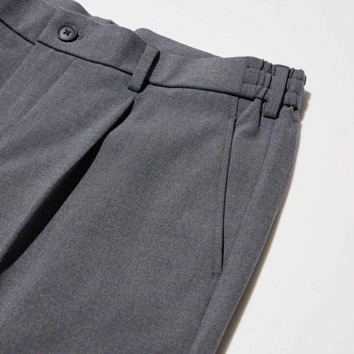 uniqlo plisserade herrbyxor med vida ben beige