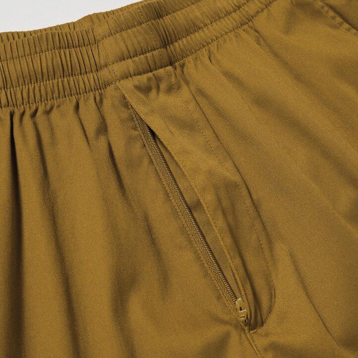 mörkgrå uniqlo dry stretch easys herrbyxor