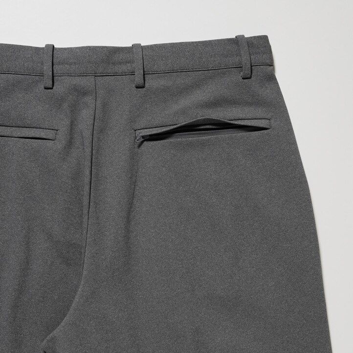 grå uniqlo smart ultra stretch ankellånga herrbyxor