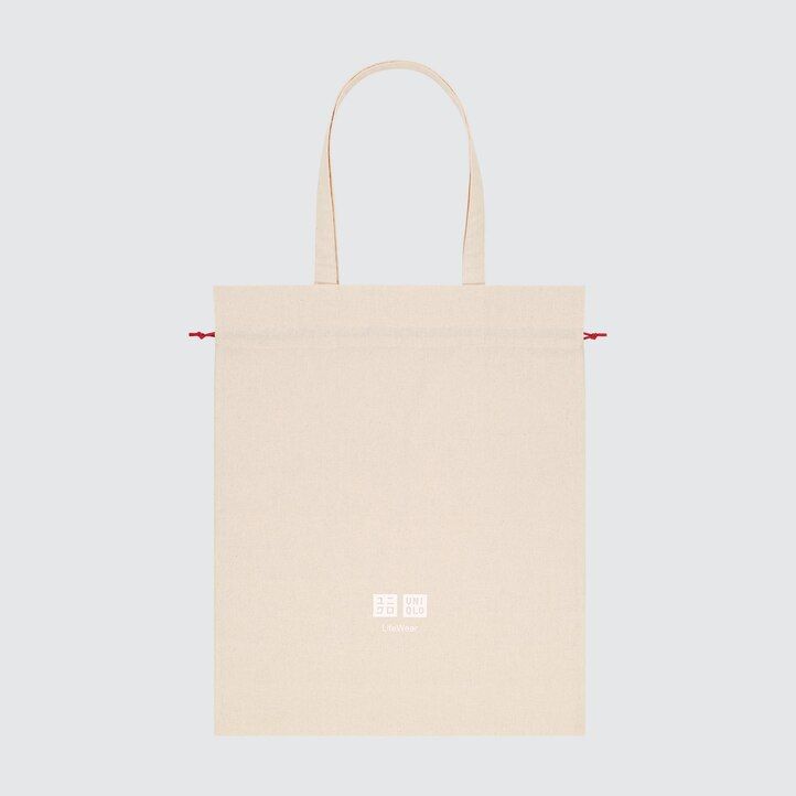 vit uniqlo presentpåse återanvändbar tygkasse damväskor