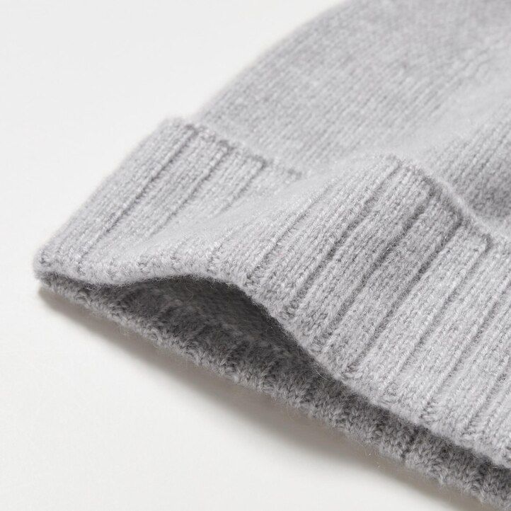 blå uniqlo 100 stickade damväskor