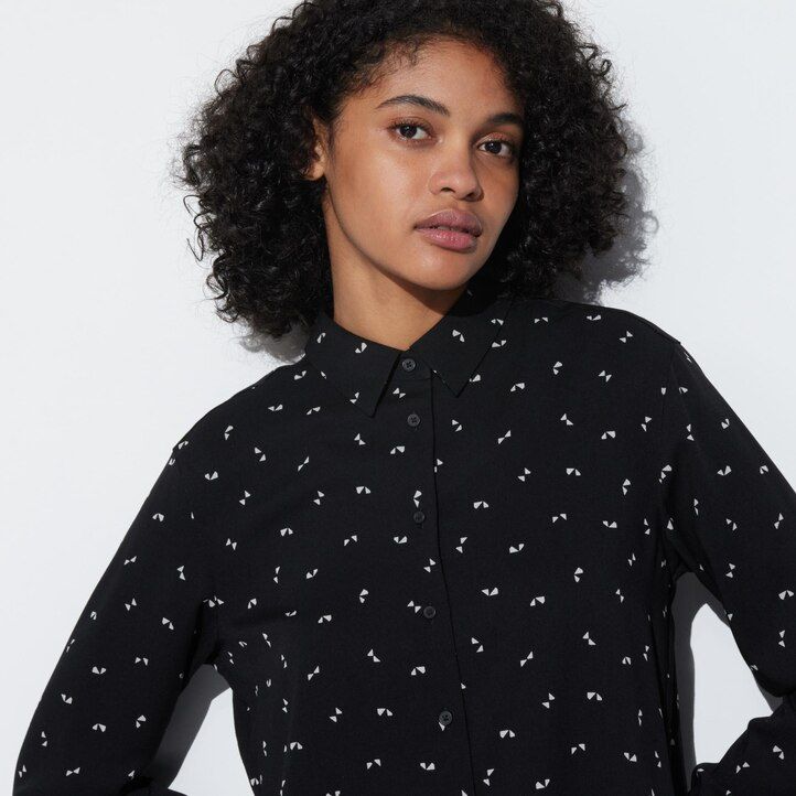 vit uniqlo rayon-blus med tryck och ärmar för kvinnor