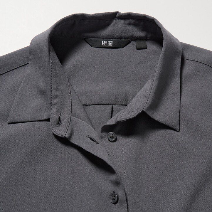 svart uniqlo-blus med rayonärmar för kvinnor