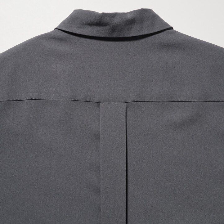 svart uniqlo-blus med rayonärmar för kvinnor
