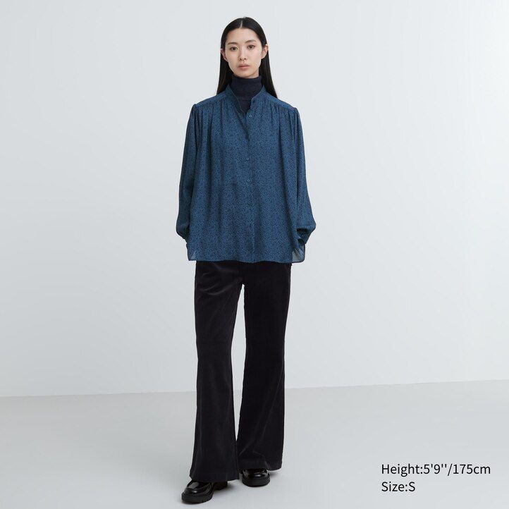 blå uniqlo tryckt volymblus för kvinnor