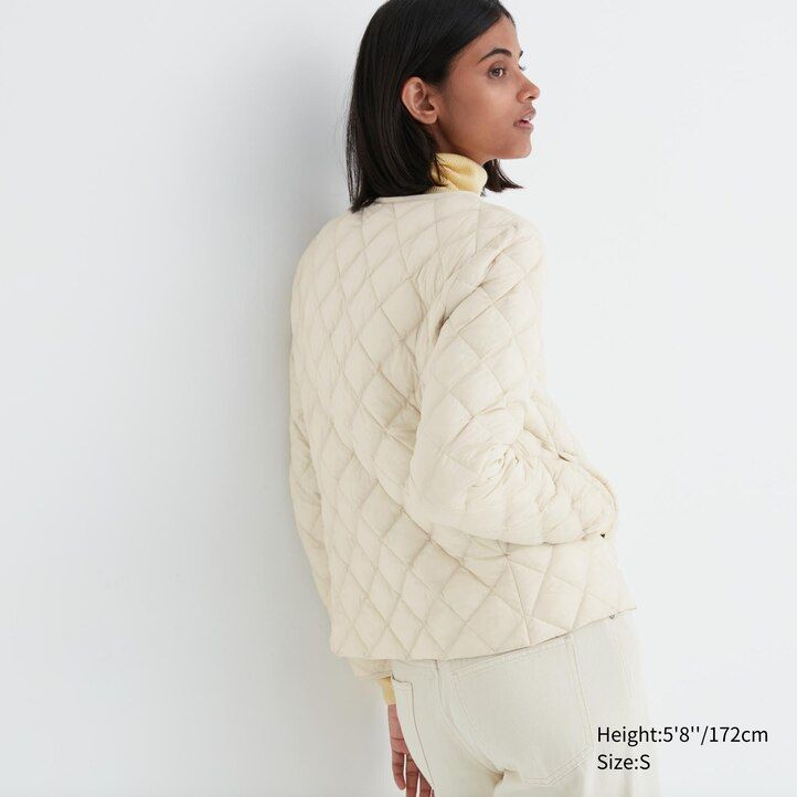 svarta uniqlo varma vadderade quiltade jackor för dam