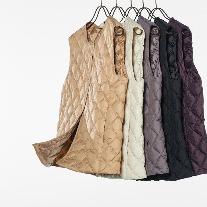 grå uniqlo varm vadderade quiltade damjackor