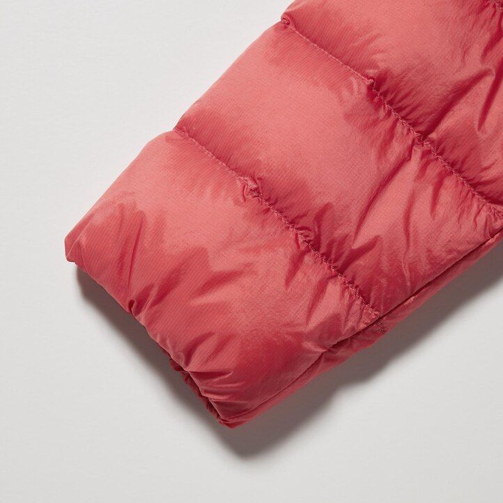 svarta uniqlo ultra light dunjackor för dam