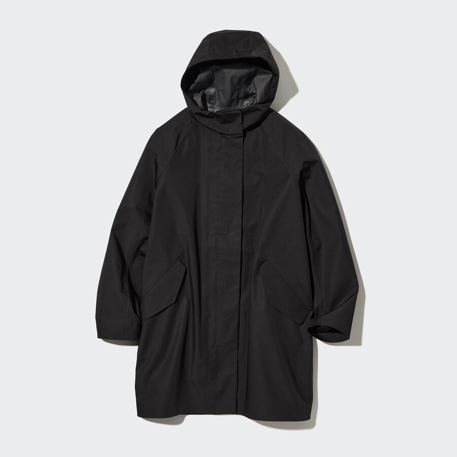 svarta uniqlo blocktech half jackets för dam