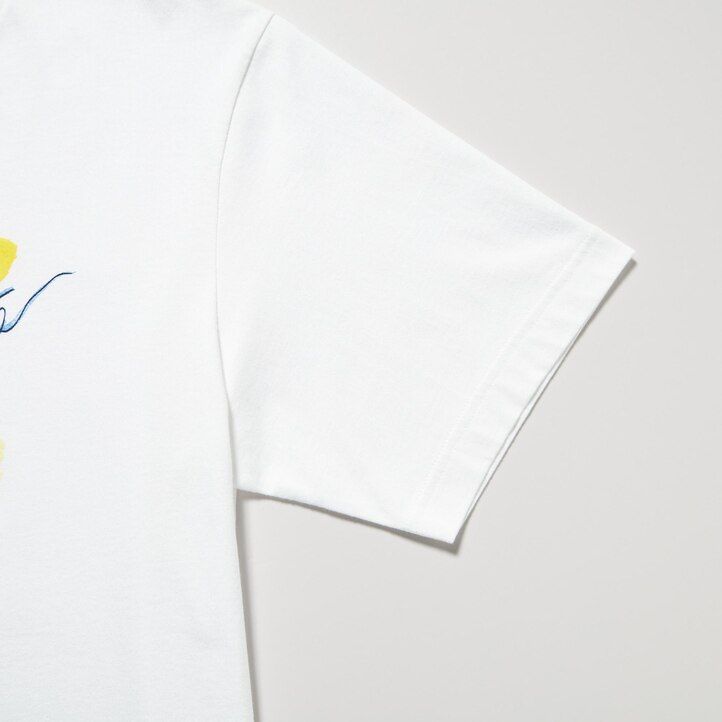 vita uniqlo peace for all graphic ines de la fressange t-shirts för kvinnor