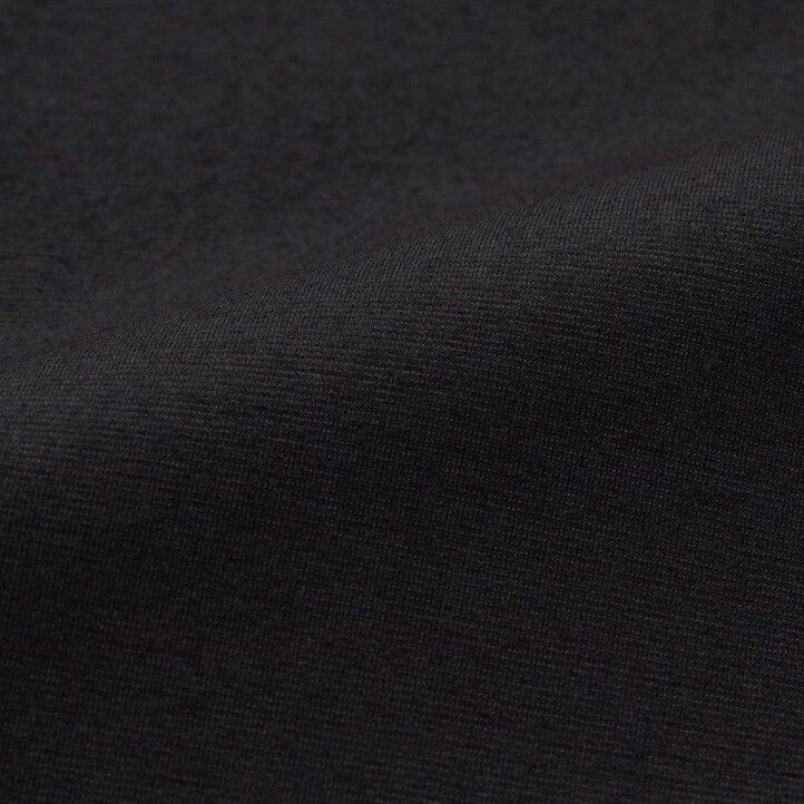mörkgrå uniqlo heattech termo-t-shirts med rund hals och ärmar för damer
