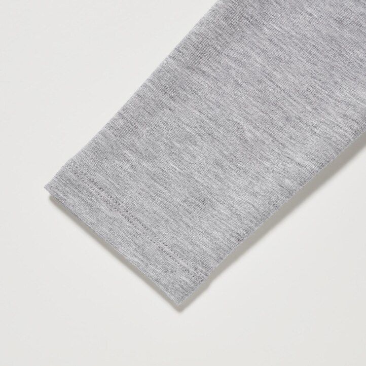 mörkgröna uniqlo heattech extra varma bomulls-t-shirts med rund hals och Ärmar för dam