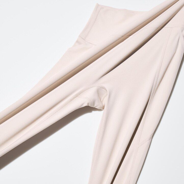 svarta uniqlo airism ultra soft-toppar med fickor för kvinnor