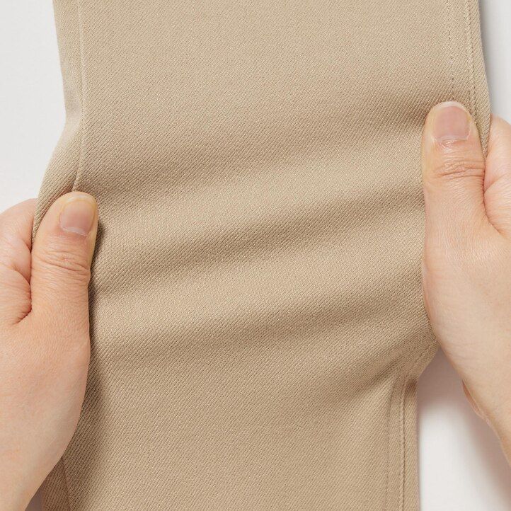 beige uniqlo ultra stretch damtoppar